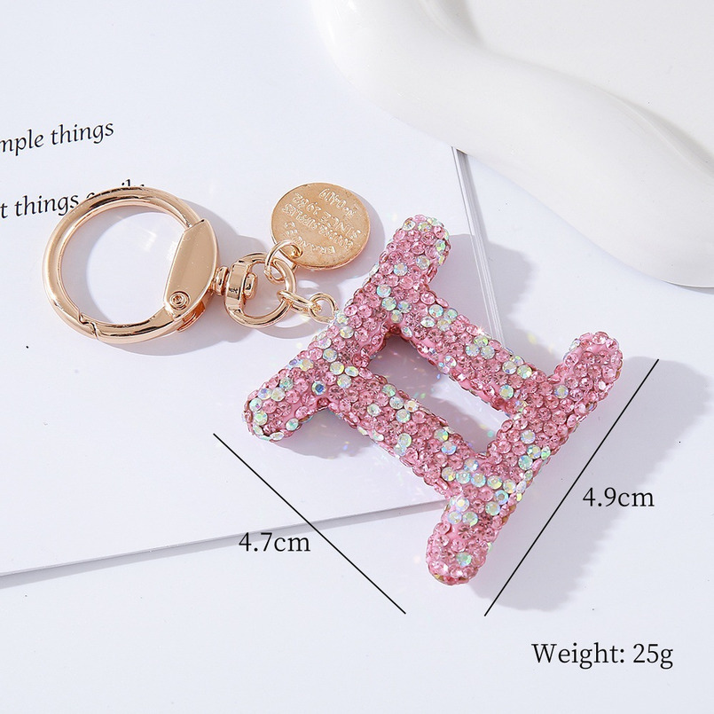 Pink rhinestone constellation car keychain, fashionable, individual and shiny handbag, special constellation pendant for car birthday gifts