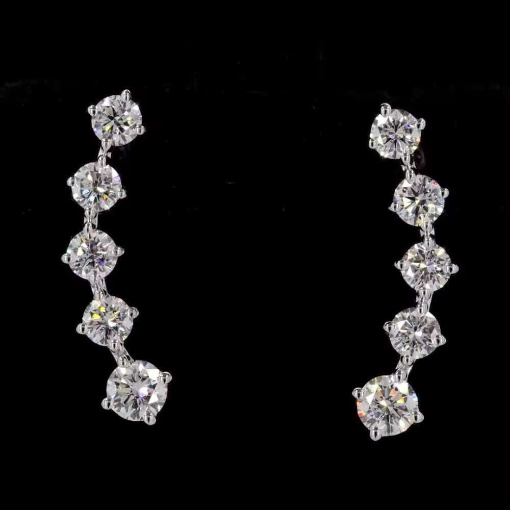 Sophisticated Feminine Accessory: Lustrous Sterling Silver Round Moissanite Solitaire Studs