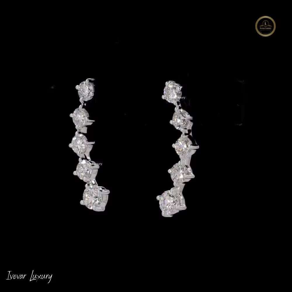 Sophisticated Feminine Accessory: Lustrous Sterling Silver Round Moissanite Solitaire Studs