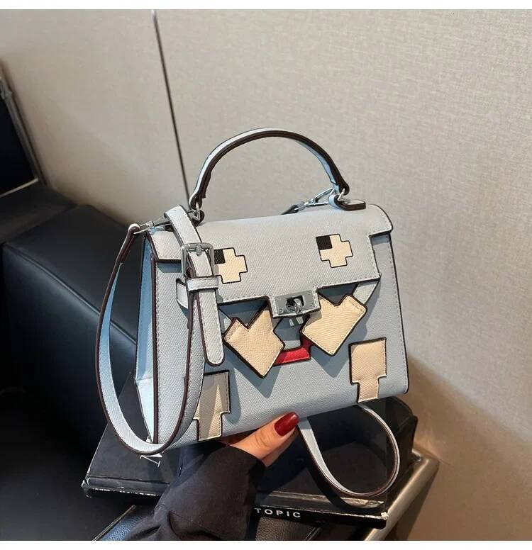 Free Shipping 2025 New Designer Bag Luxury Cartoon Small Square Shoulder Bag Exquisite And Practical Wallet Fashion Trend High Quality Women's Ha