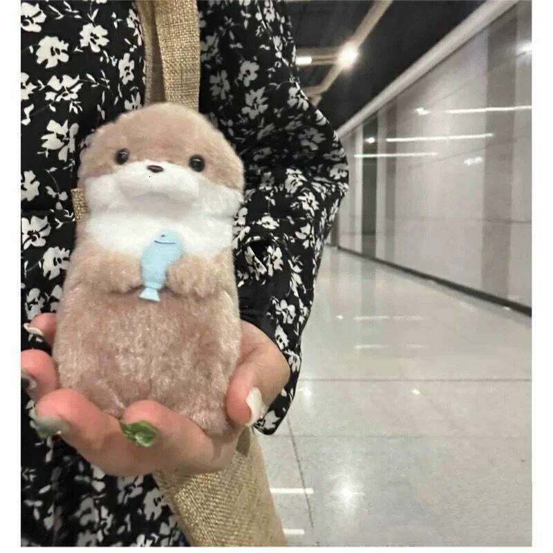 Free shipping Little Otter Hug Fish Plush Doll Cute Girl Heart Keychain Pendant Creative Gift