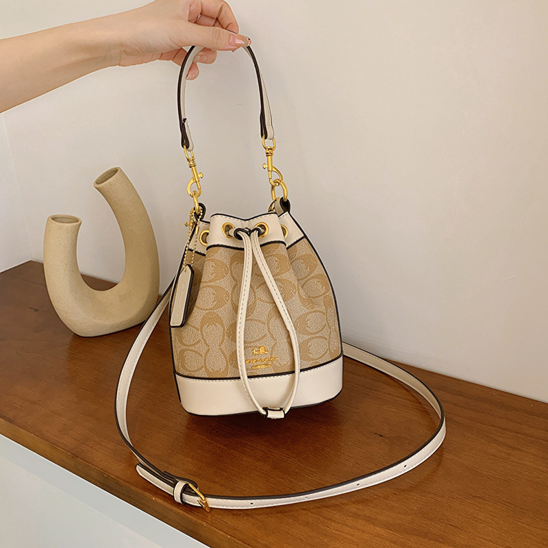 new free shipping Cross Body bag for woman fashion vintage Casual bucket handbag versatile shoulder bag white black