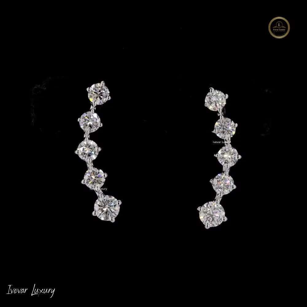 Sophisticated Feminine Accessory: Lustrous Sterling Silver Round Moissanite Solitaire Studs