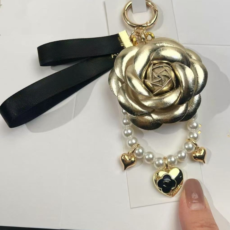 2025 Spring limited edition lipstick designer keychain key chain rings women girls lovely rose camellia flower design keychain bag charm accessories F