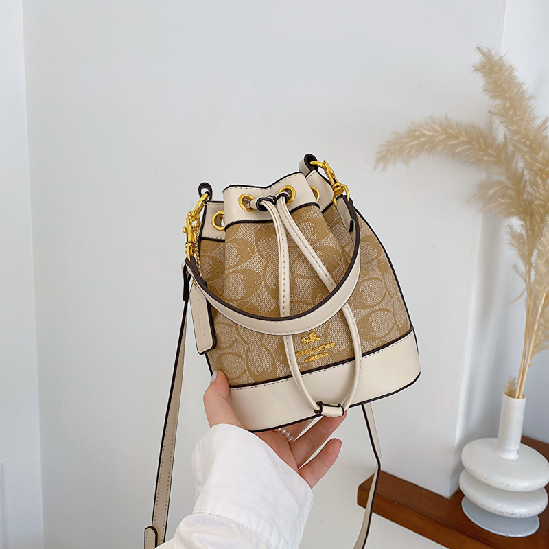 new free shipping Cross Body bag for woman fashion vintage Casual bucket handbag versatile shoulder bag white black