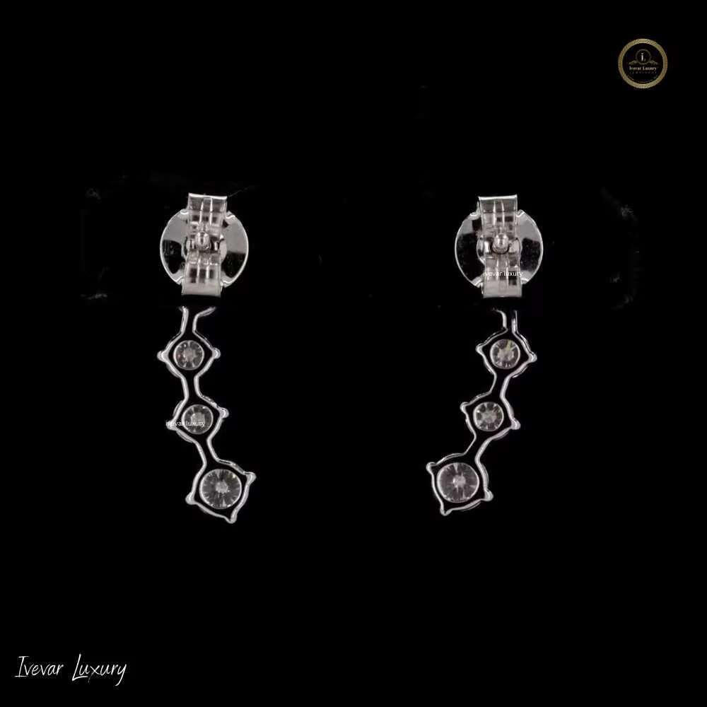 Sophisticated Feminine Accessory: Lustrous Sterling Silver Round Moissanite Solitaire Studs