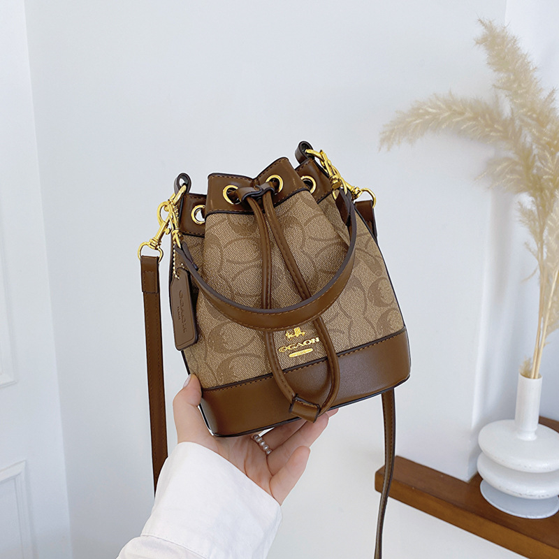new free shipping Cross Body bag for woman fashion vintage Casual bucket handbag versatile shoulder bag white black