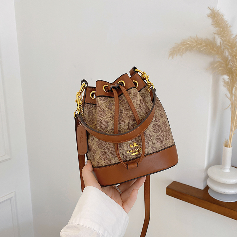 new free shipping Cross Body bag for woman fashion vintage Casual bucket handbag versatile shoulder bag white black