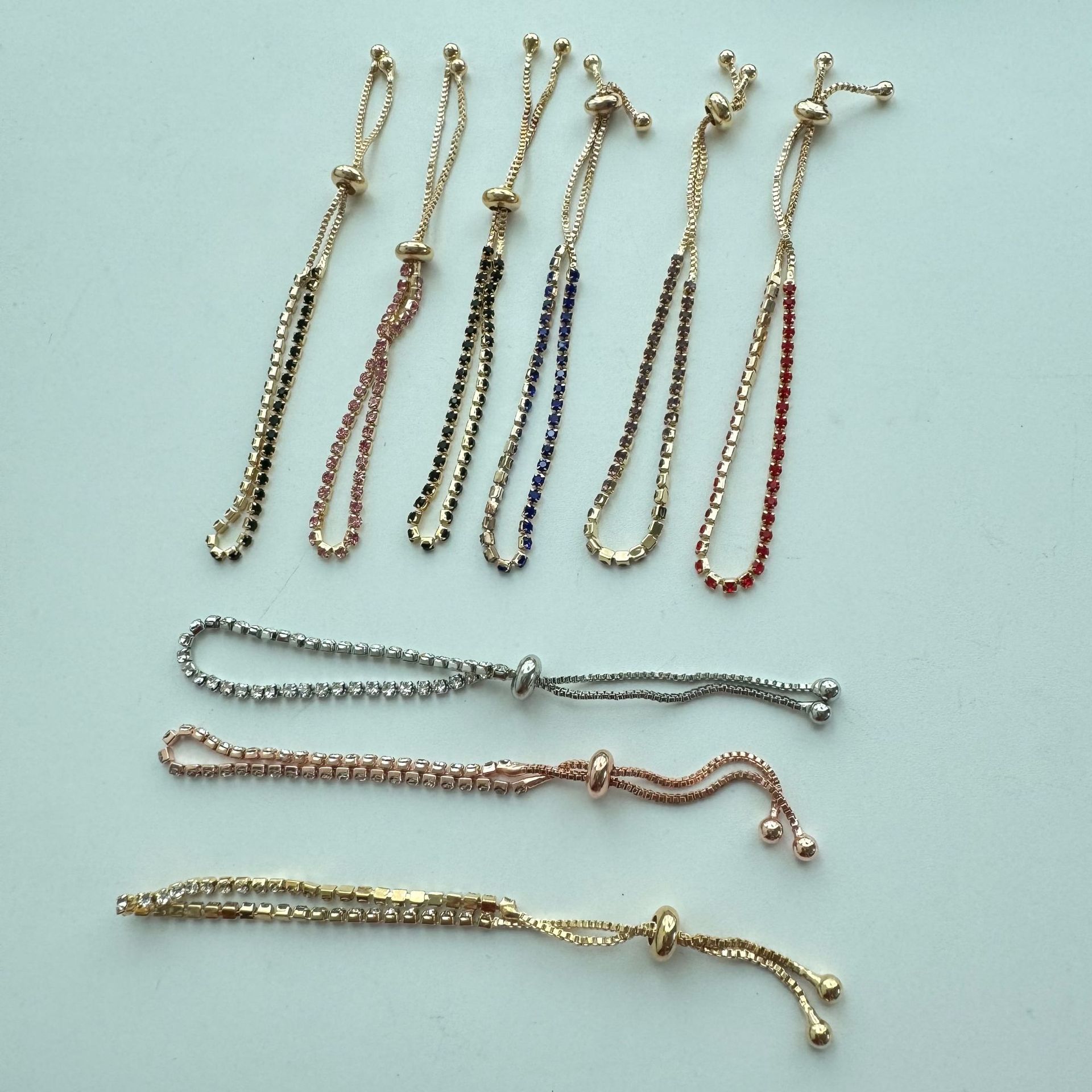 Chic Design Band Bracelets Featuring Hypoallergenic Materials & Sparkling Synthetic Gemstones