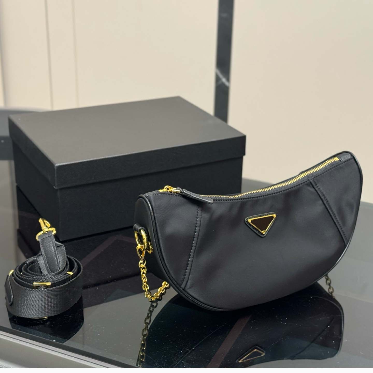 Designer Bag Tote bag purse Crescent Shape Nylon Shoulder Bag with Chain Handle and Sport Strap Enamel Triangle Accent Stylish and Functional