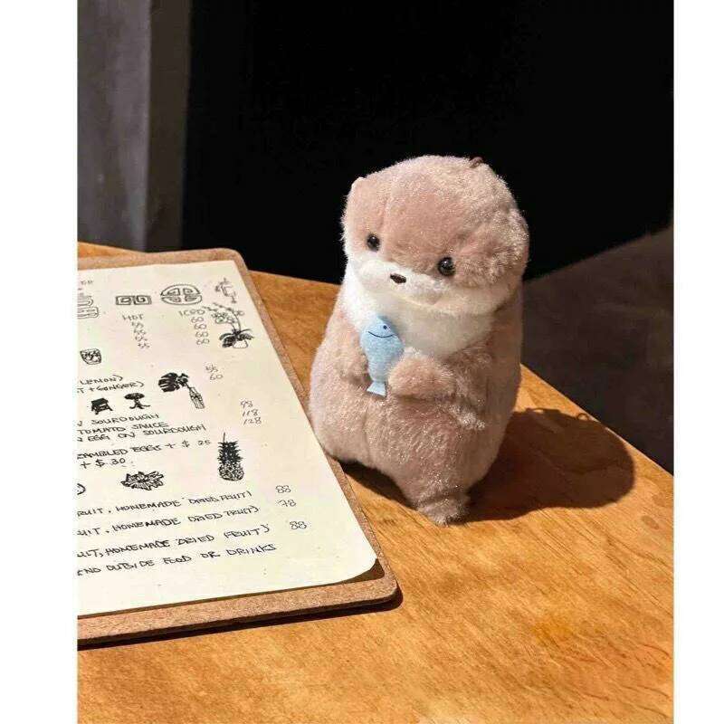 Free shipping Little Otter Hug Fish Plush Doll Cute Girl Heart Keychain Pendant Creative Gift