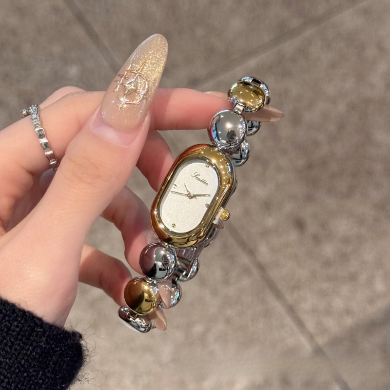 Chic Female Chronograph: Round Dial Luxury Ladies' Gold Watch w/Steel Strap