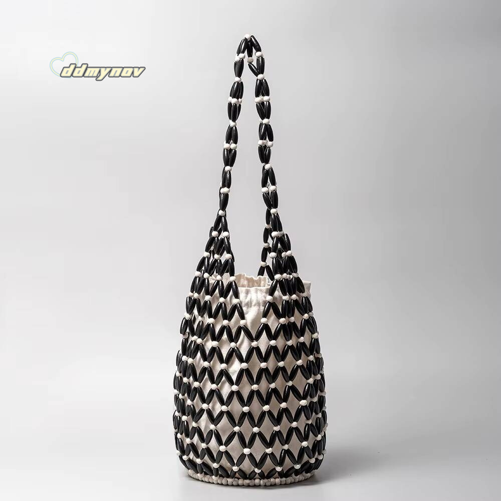 Women Woven hand summer design hollow-out wooden bead tote bucket shoulder bag female Reticulate netted canvas beach handbag ddmynov