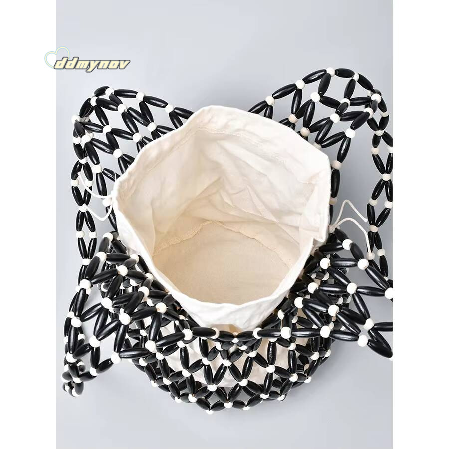 Women Woven hand summer design hollow-out wooden bead tote bucket shoulder bag female Reticulate netted canvas beach handbag ddmynov