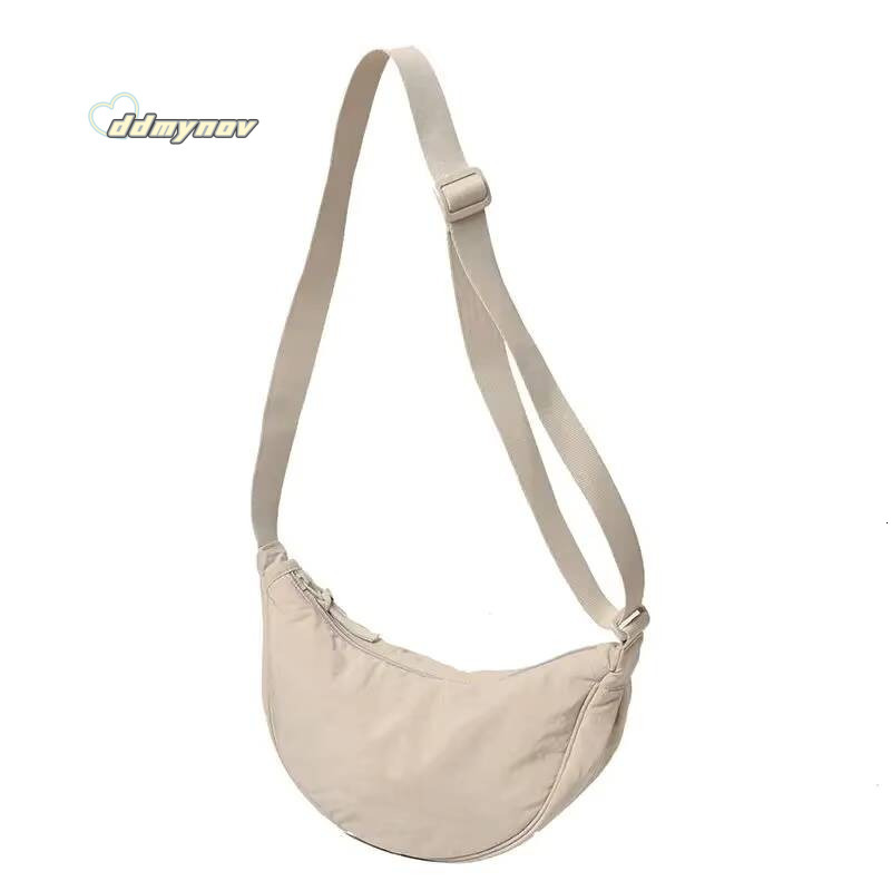 New Simple Casual Solid Color Nylon Large Capacity Women's Dumpling Shoulder Bag for Travel and Commuting ddmynov