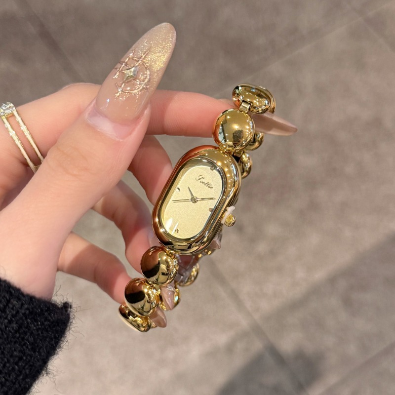 Chic Female Chronograph: Round Dial Luxury Ladies' Gold Watch w/Steel Strap