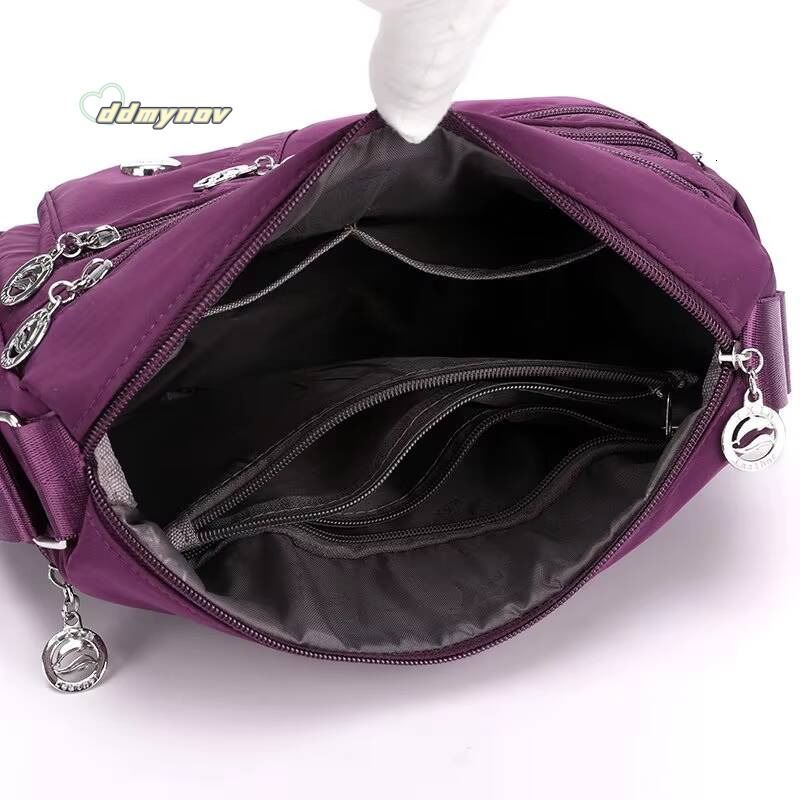 Women's Large Capacity Shoulder Waterproof and Wear Resistant Multi Pocket Commuter Leisure Outdoor Crossbody Bag ddmynov