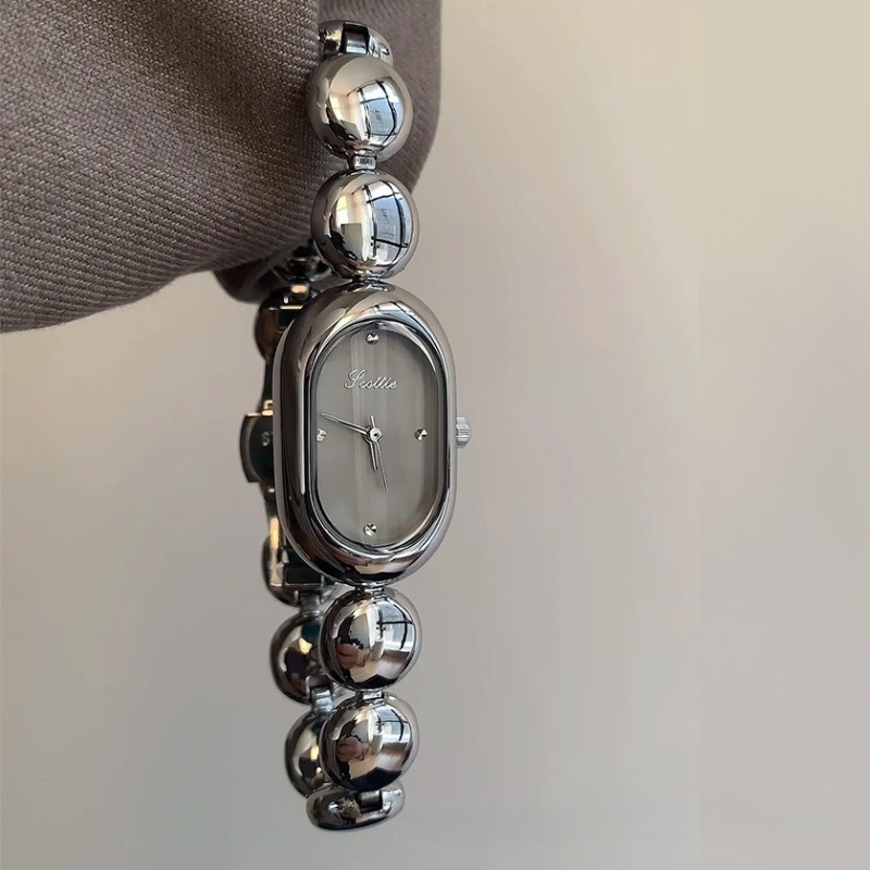 Chic Female Chronograph: Round Dial Luxury Ladies' Gold Watch w/Steel Strap