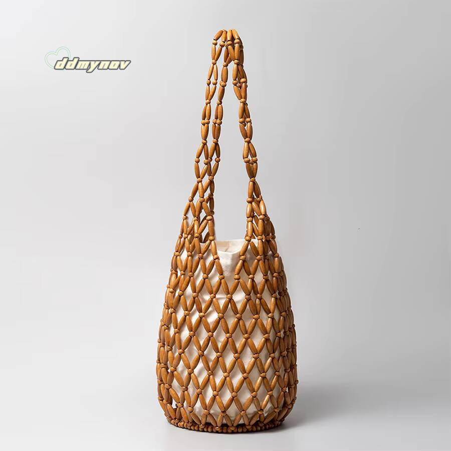 Women Woven hand summer design hollow-out wooden bead tote bucket shoulder bag female Reticulate netted canvas beach handbag ddmynov