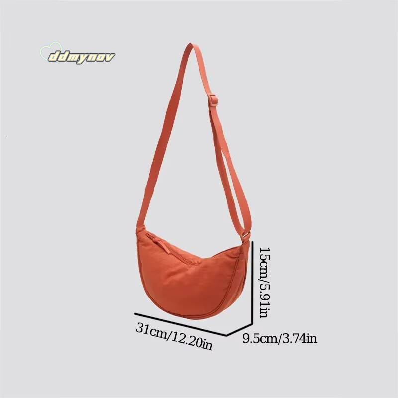 New Simple Casual Solid Color Nylon Large Capacity Women's Dumpling Shoulder Bag for Travel and Commuting ddmynov