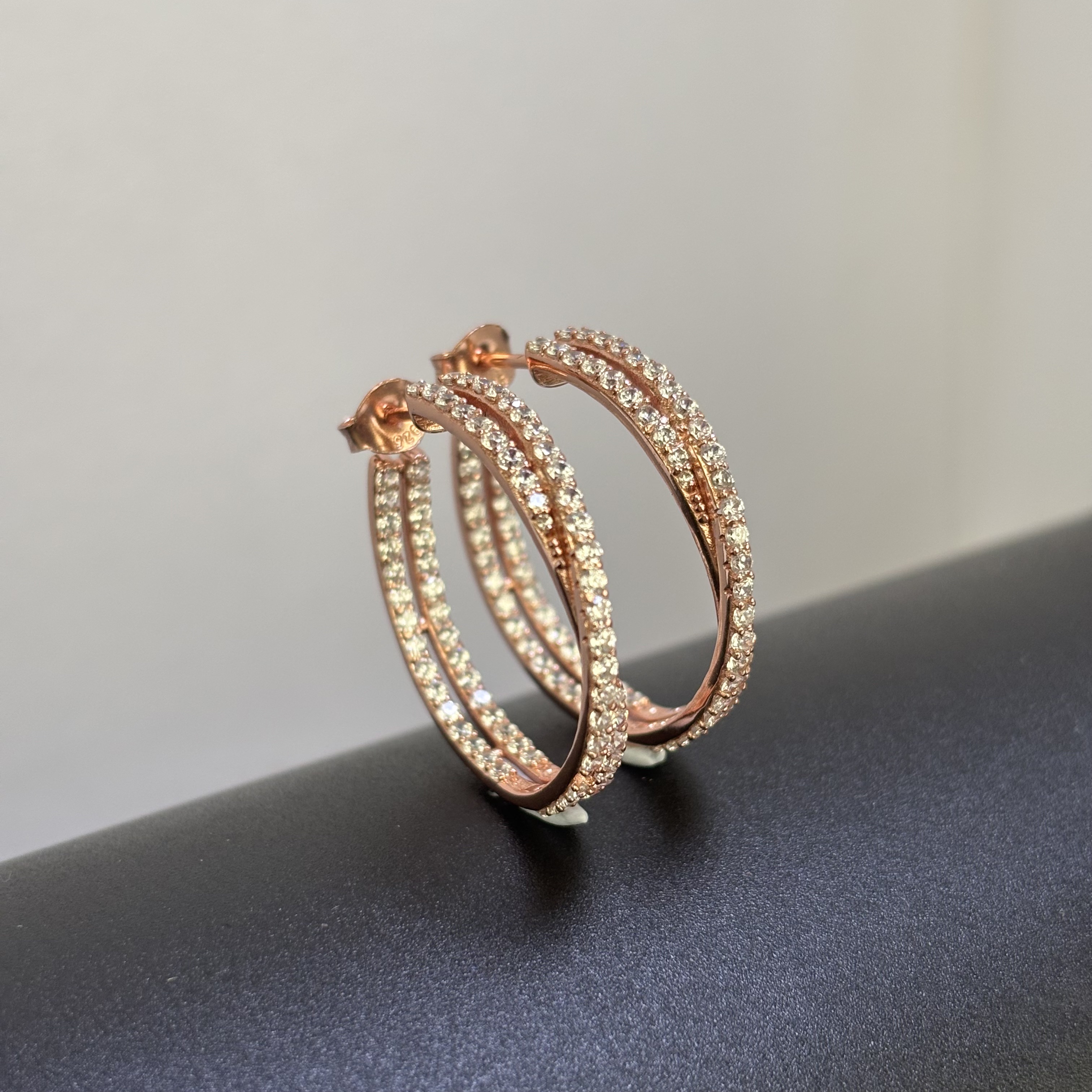 Twisted rope interlocking circles earrings, made of 925 silver, full diamond setting effect, unique earrings design that sparkles and shines