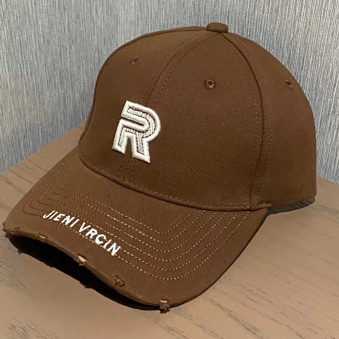 2025 New Trend R Letter Irregular Baseball Cap Men and Women The Same Edged Brim Hard Top Fashion Cap Versatile and Thin W250614