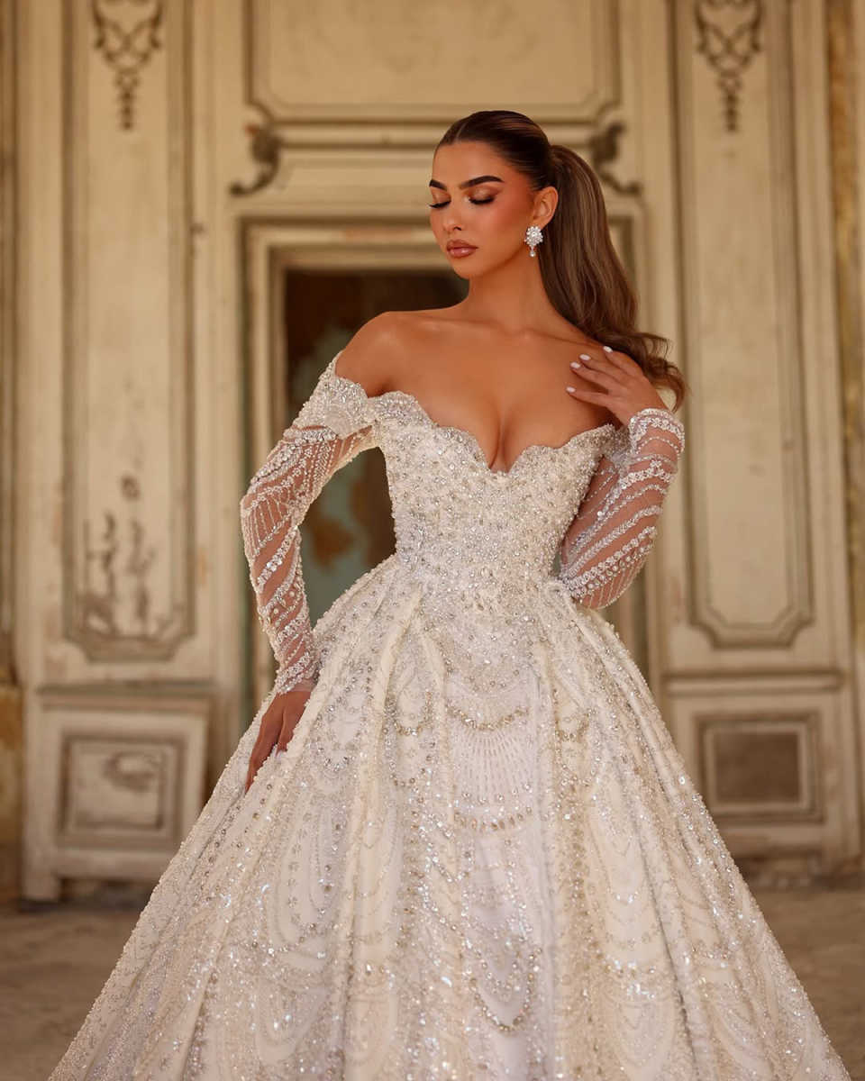 Luxury Glitter Wedding Dresses With Sweetheart Long Sleeves Appliques Beading Gorgeous Dubai Bridal Gown Bling Sequins Crystal Party Gowns vestido de 
