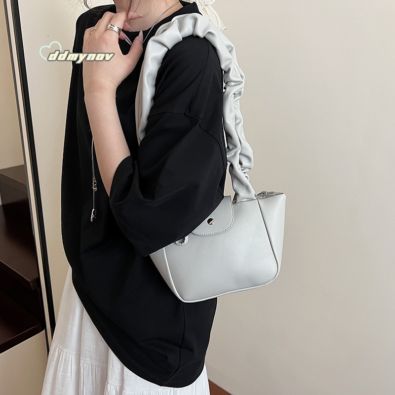 Korean Style Niche Pleated Handbag with Bowknot Bucket for Women 2025 Summer New Single Shoulder Underarm Tote Bag ddmynov