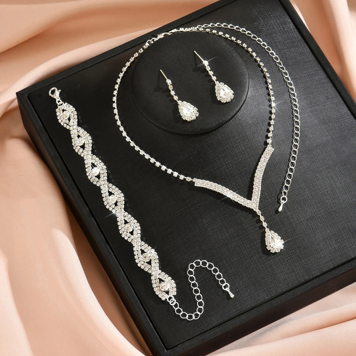 4-piece bridal jewelry set for women V-shaped pendant crystal necklace earrings adjustable twist bracelet 250609