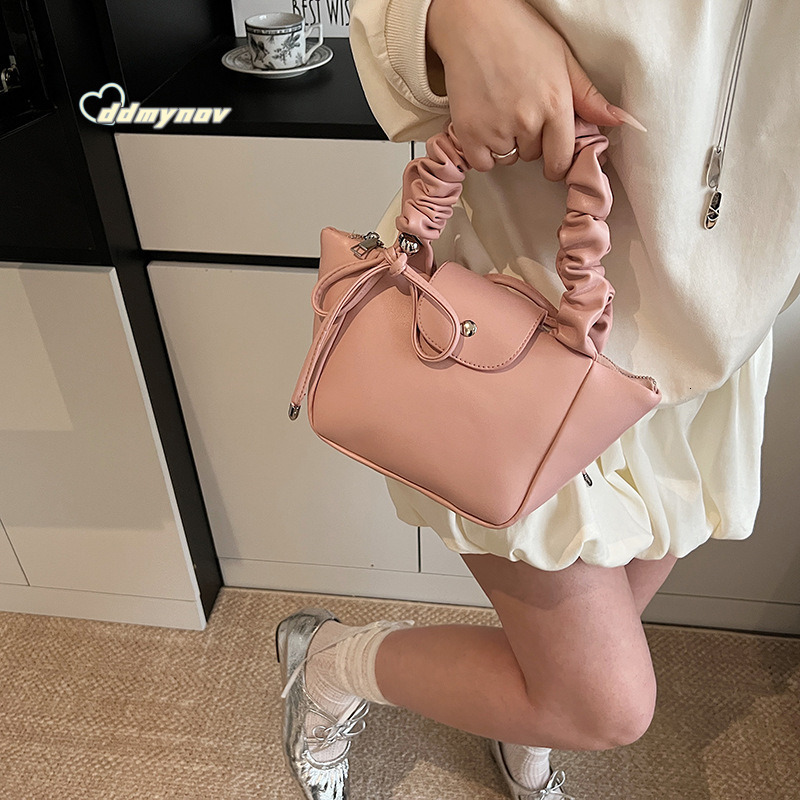 Korean Style Niche Pleated Handbag with Bowknot Bucket for Women 2025 Summer New Single Shoulder Underarm Tote Bag ddmynov