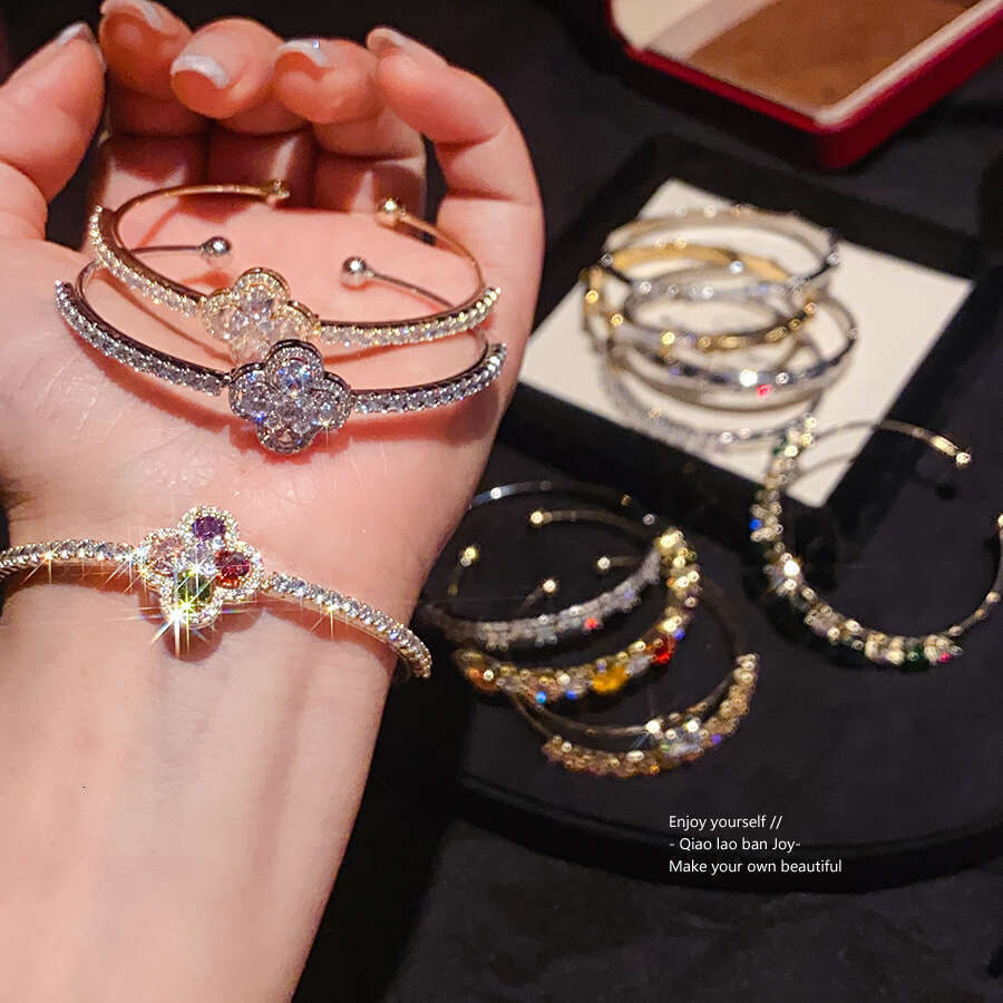 2025 New Luxury Jewelry Designer Bracelet Cross border European and American Zircon Four petal Flower Blossoming Bracelet Light Luxury High end Trendy
