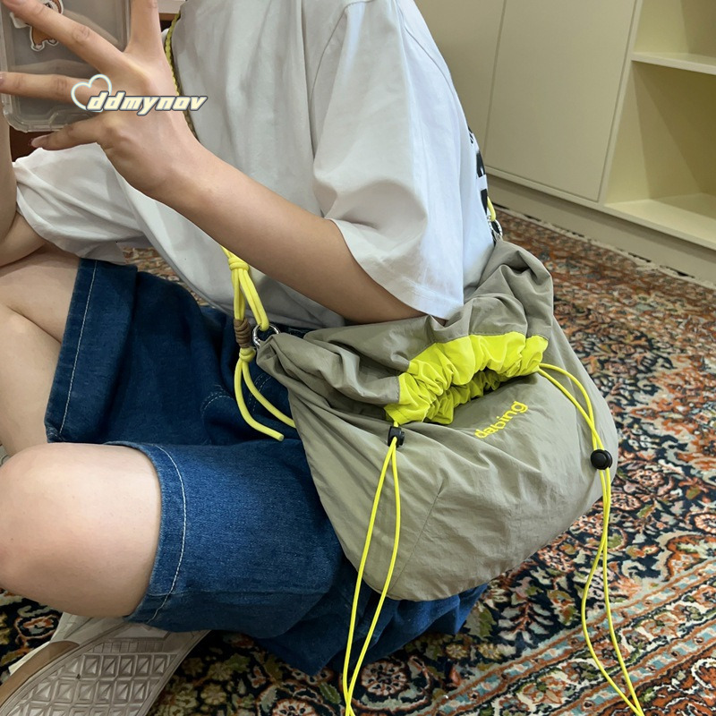 2024 New Fashion Versatile Drawstring Crossbody Personality Simple Single Shoulder Women's Bag Color-blocking Lightweight Handbag ddmynov