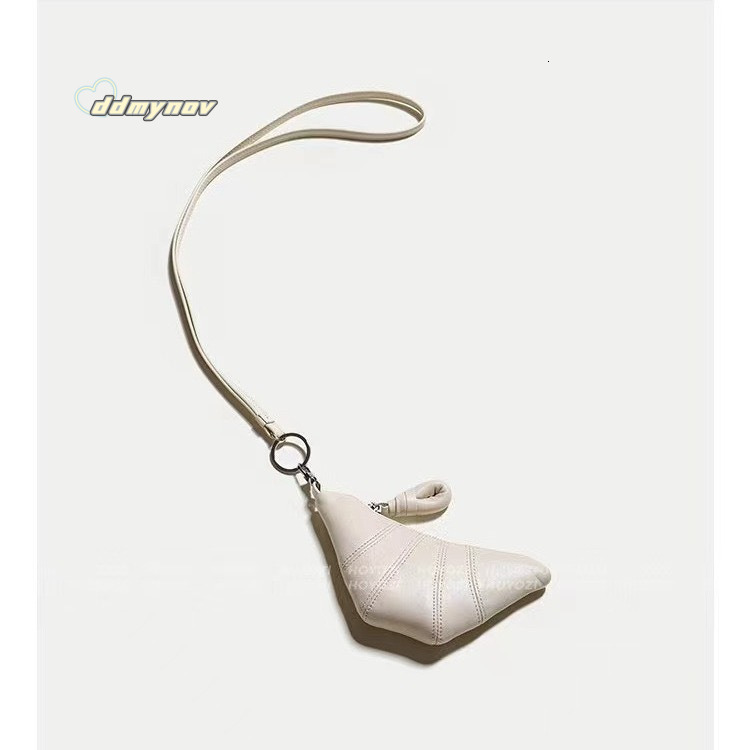 2025 Niche Design Textured Soft Leather Mini Croissant Bag Exquisite Handheld Lanyard Coin Purse ddmynov