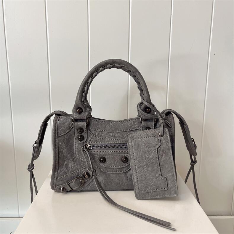 Free Shipping Designer Bag 2025 Paris Rivet Motorcycle Bag INS Hot Girl Bag French High-End Retro Trend Handbag Pillow Bag Single Shoulder Crossbody B