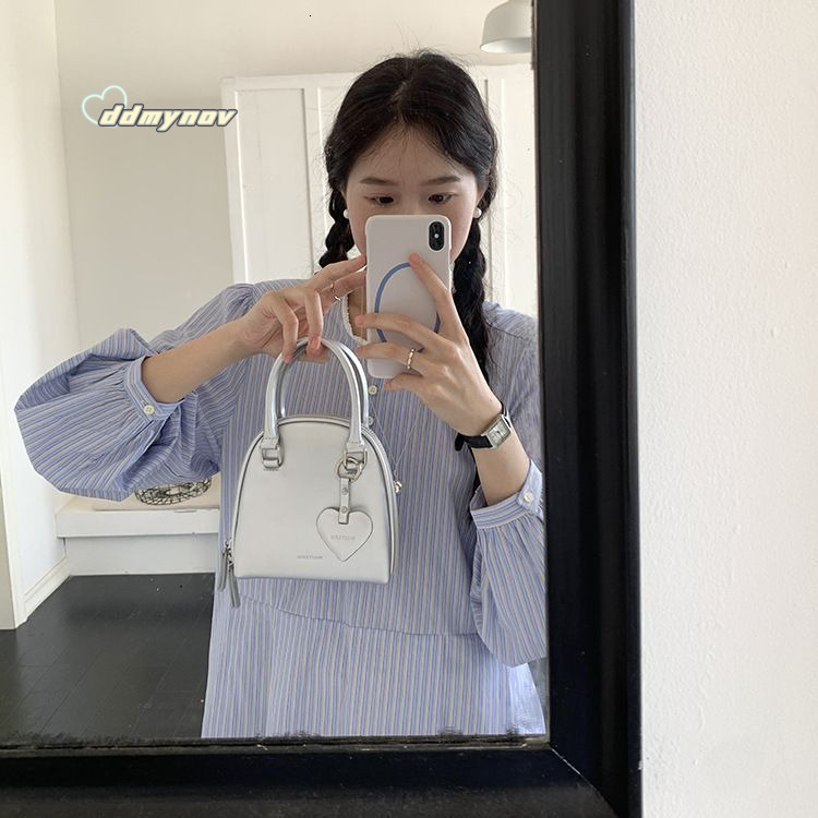 Rourou Chen Whiterm Korean Niche Design Women's New Cute Handheld Shell Single Shoulder Crossbody Small Bag ddmynov