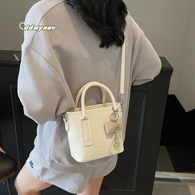 Textured Handbag for Women 2025 New Trendy Fashion Versatile Shoulder Commuter Crossbody Bucket Bag ddmynov