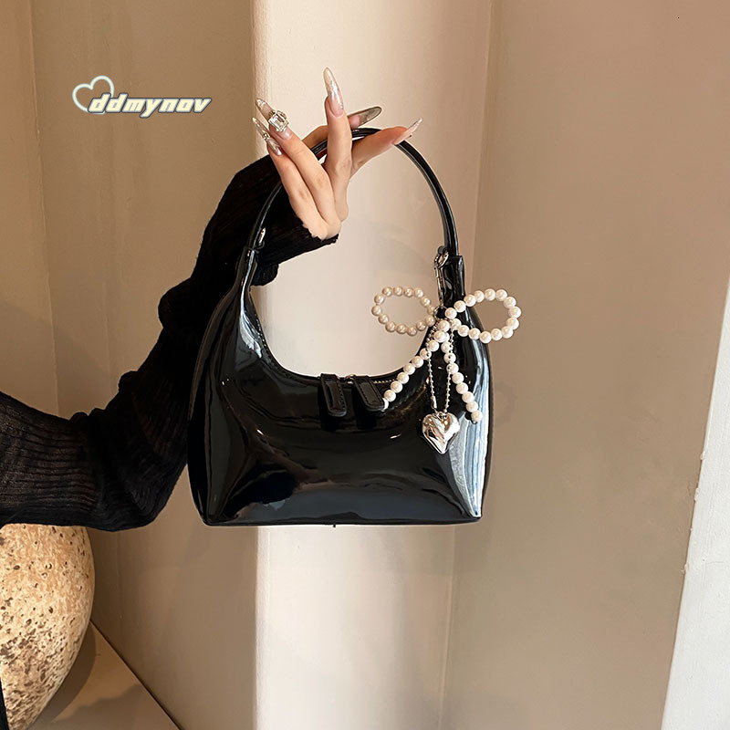 2024 New French Style Handbag Upgraded Niche Crescent Underarm Patent Leather Shiny Fashion Versatile Single Item Saddle Bag ddmynov