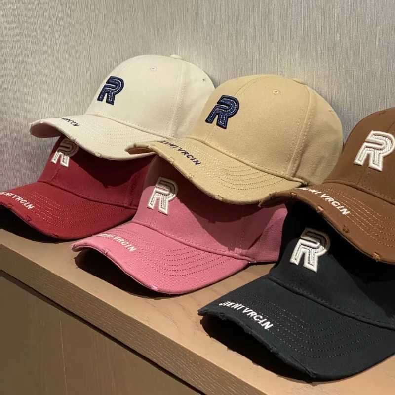2025 New Trend R Letter Irregular Baseball Cap Men and Women The Same Edged Brim Hard Top Fashion Cap Versatile and Thin W250614