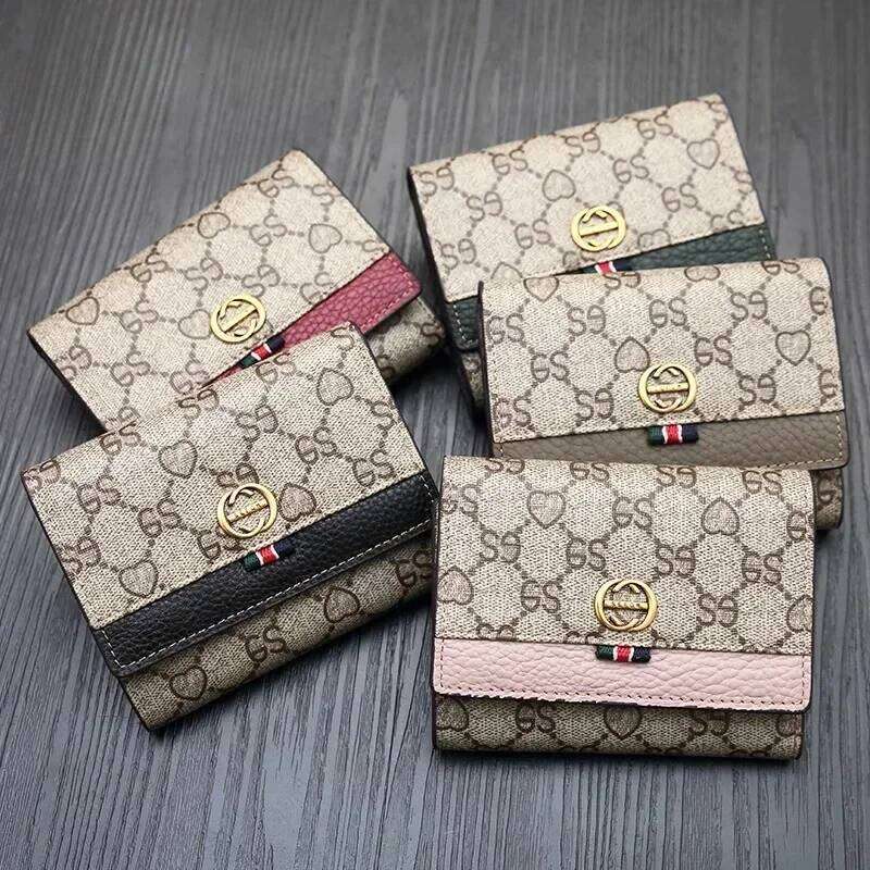 Short Leather Holdup Handbag Folding cowhide women's Purse women bags high-grade