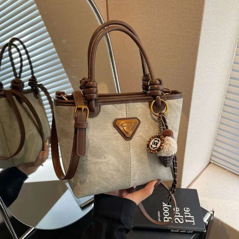 Designer Free Shipping New Fashion Comting High End Hand Held Bucket Bag Shoulder Crossbody For Women Free shipping
