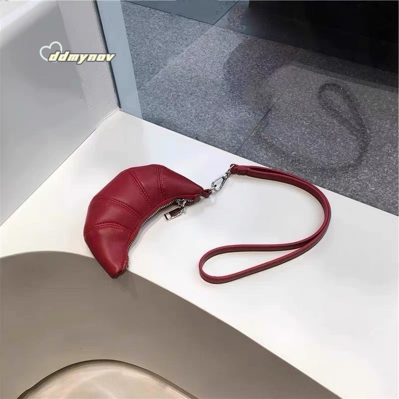 2025 Niche Design Textured Soft Leather Mini Croissant Bag Exquisite Handheld Lanyard Coin Purse ddmynov