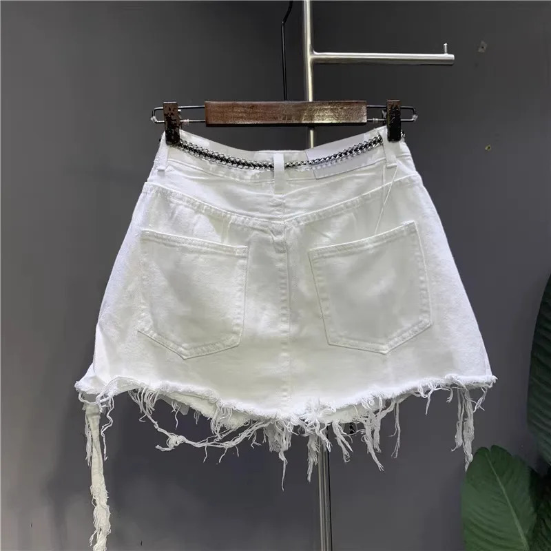 Korean White Raw Irregular Denim Skirt Womens AntiWalk Naked Hole Pocket Exposed Short Skirt 250612