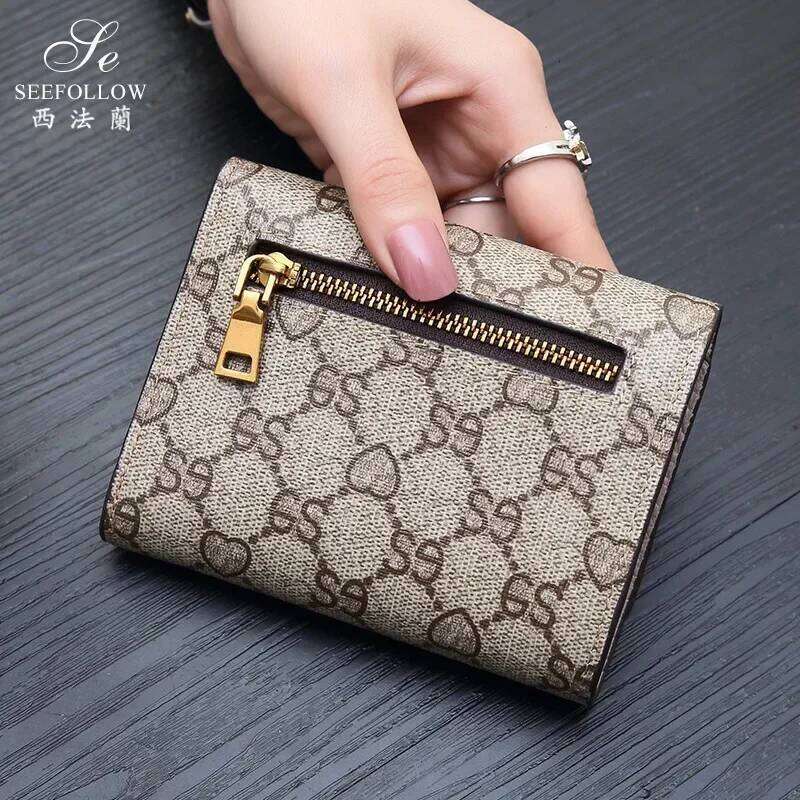 Short Leather Holdup Handbag Folding cowhide women's Purse women bags high-grade