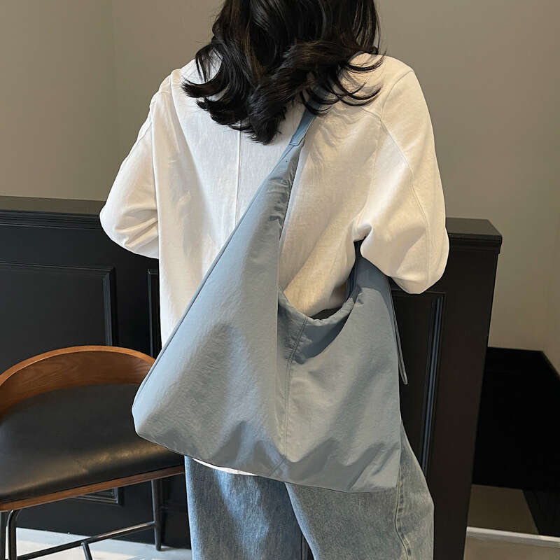 Korean Style Large Capacity Tote for Women 2025 Summer New Fashion Simple Crossbody Lightweight Commuter Shoulder Bag