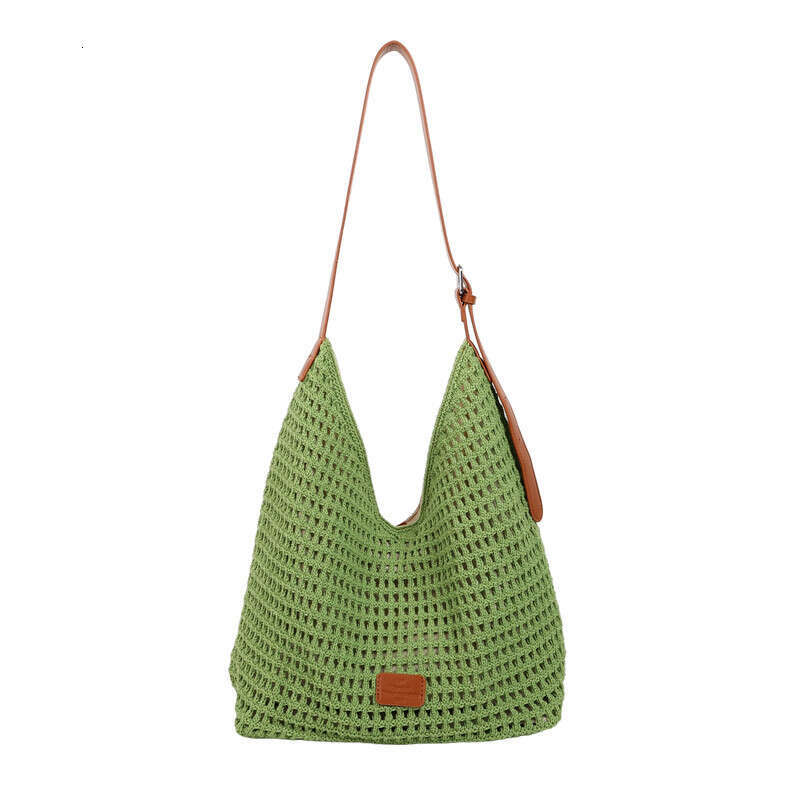 2025 Summer New Hollow Knit Large Capacity Beach Vacation Straw Casual Commuter Tote Bag