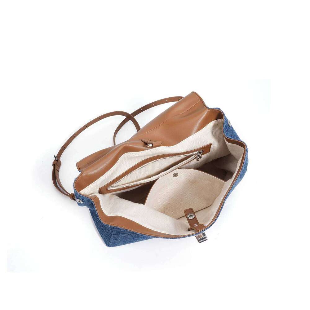 Modern classic design backpack for girls, popular and retro style. Made of denim fabric. Fashionable school bag. Handbag. Backpa