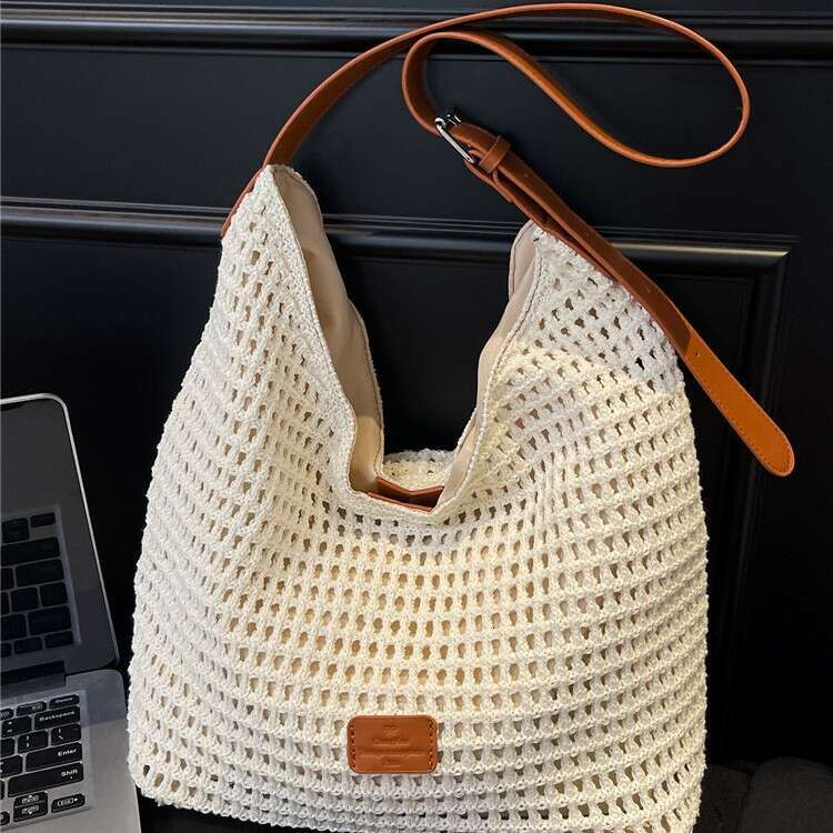 2025 Summer New Hollow Knit Large Capacity Beach Vacation Straw Casual Commuter Tote Bag