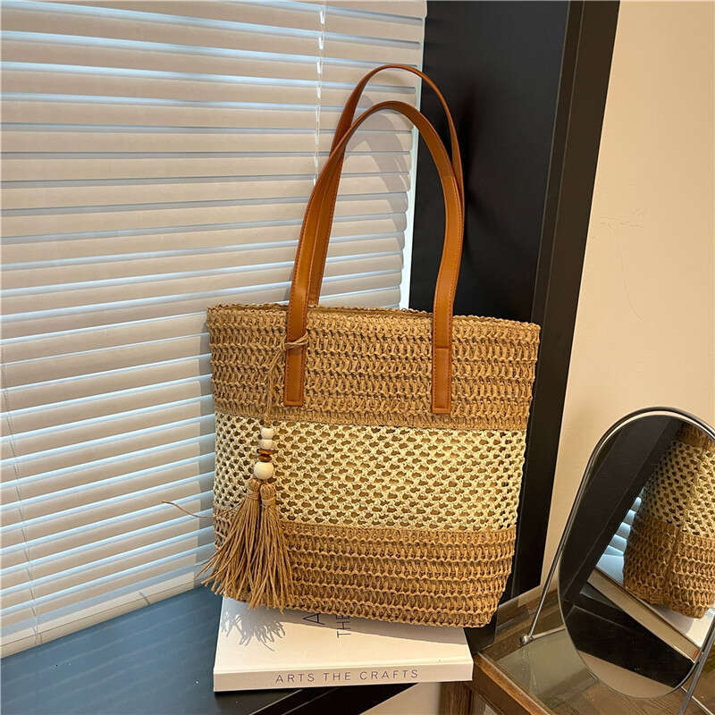 Beach Vacation Straw for Women 2025 New Hollow Woven Fashion Commuter Large Capacity Shoulder Bag
