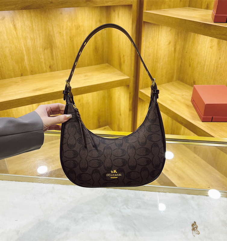 Free shipping designer high-end women's bag 2025 new trendy and fashionable crossbody bag armpit bag net Red Bull horn bag single shoulder bag tr