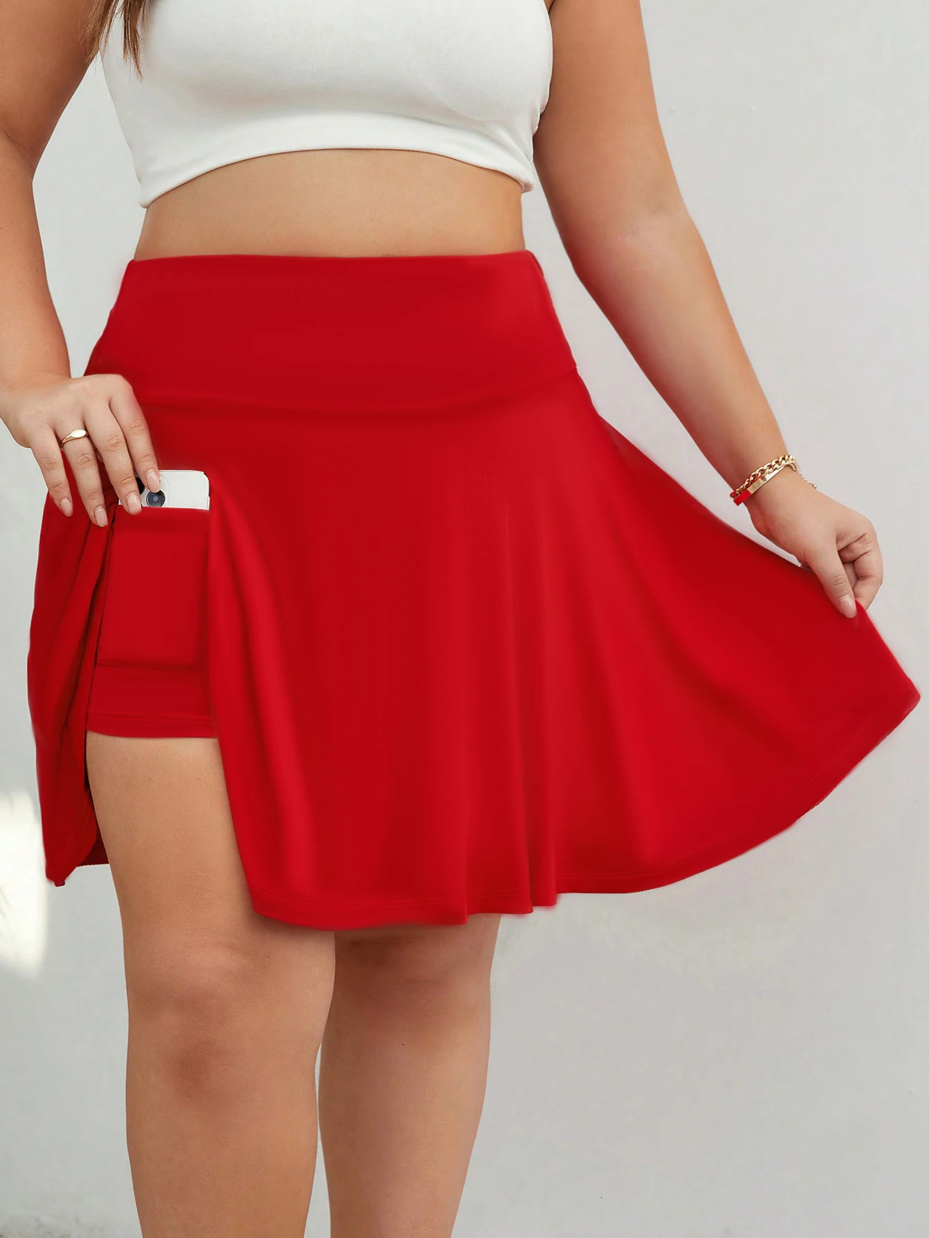 The plussize womens clothing is casual and comfortable featuring two short skirts 250610A